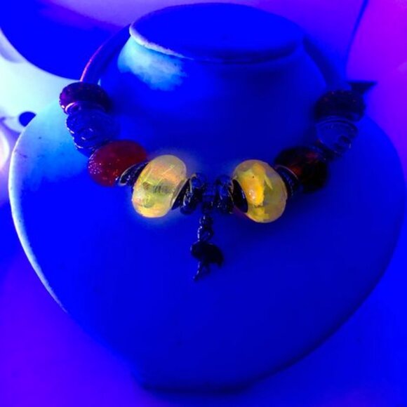 Silver Twist Bracelet with Orange Glow in the Dark Beads and Crystal Bird Charm - Picture 2 of 4